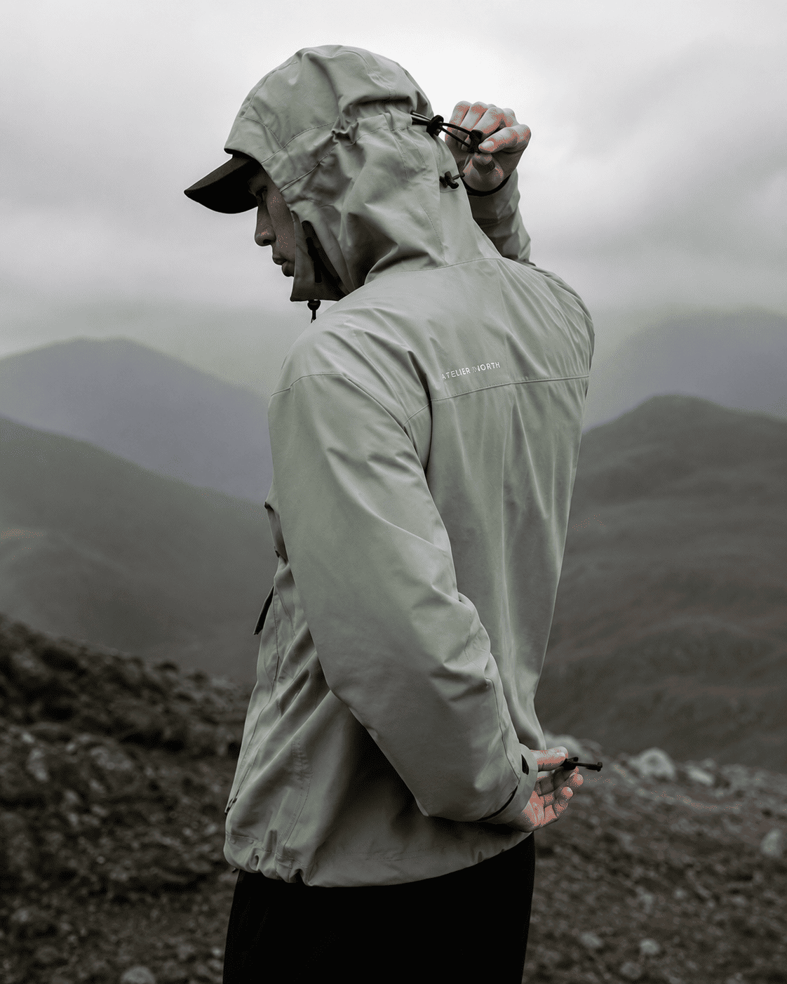 Adjustable hem and hood cinch